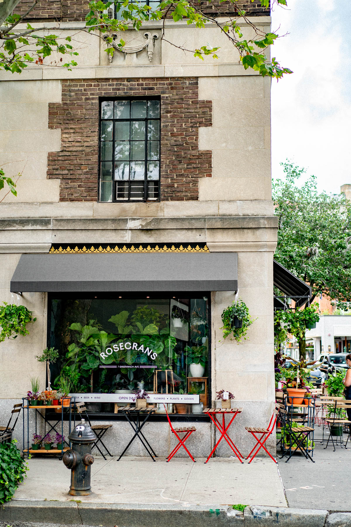 A flower and plant shop called Rosecrans occupies a corner storefront in the West Village.