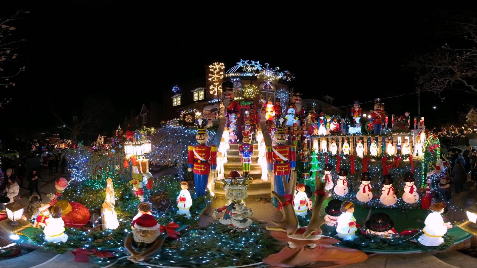 A house in Dyker Heights is covered in elaborate Christmas light displays and decorations.