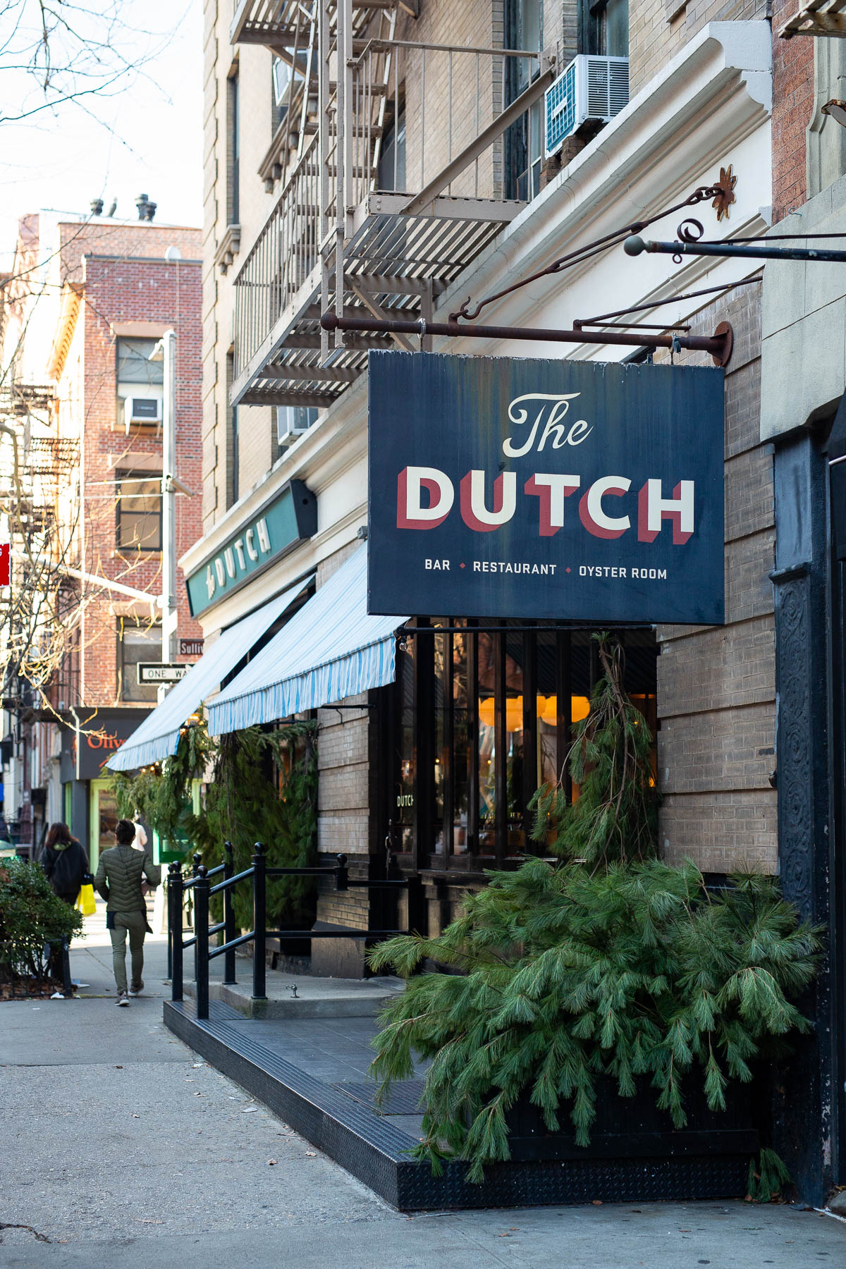 The Dutch restaurant storefront and sign on a SoHo street corner