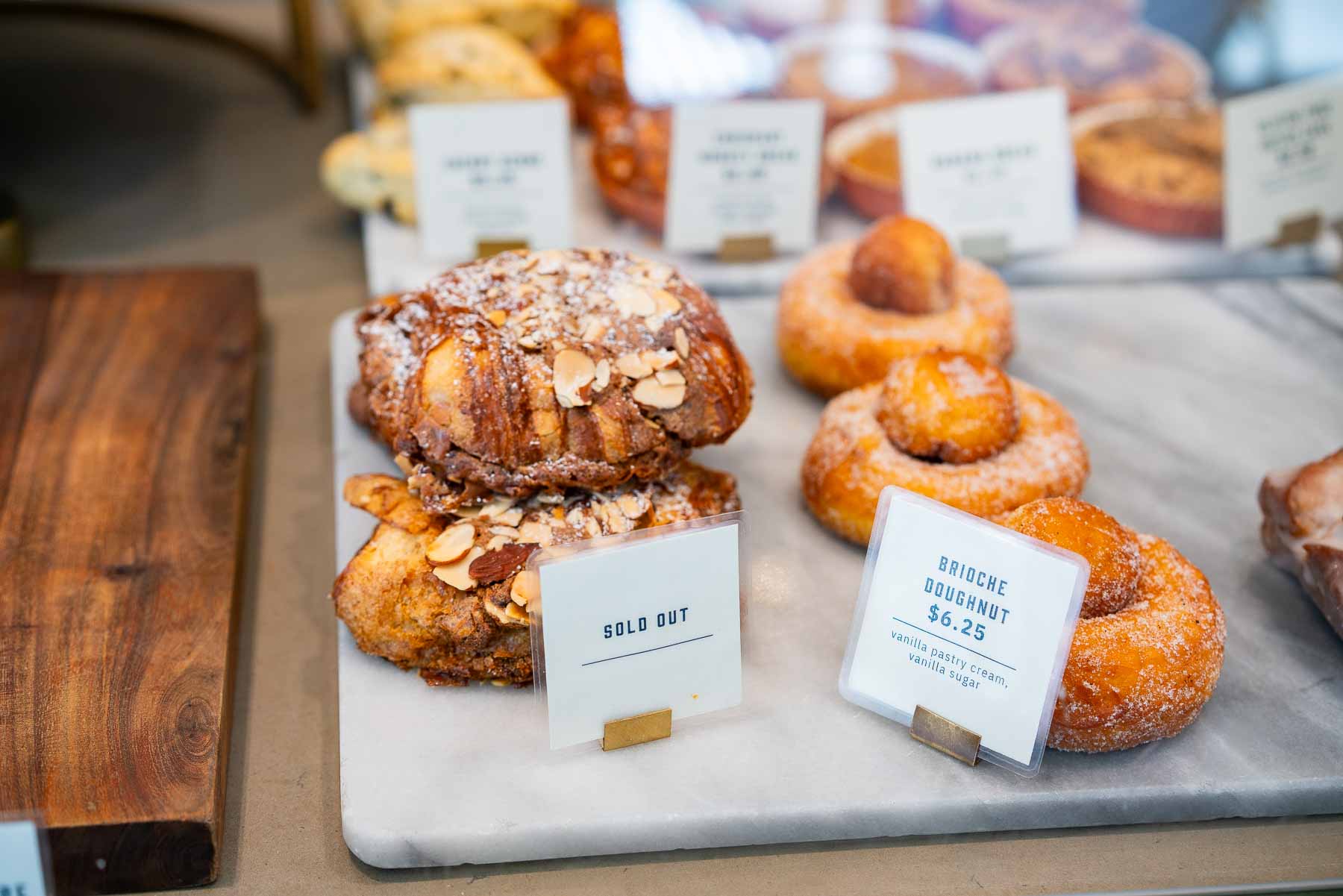 Almond croissant and Brioche Doughnut on display at Mah-Ze-Dahr