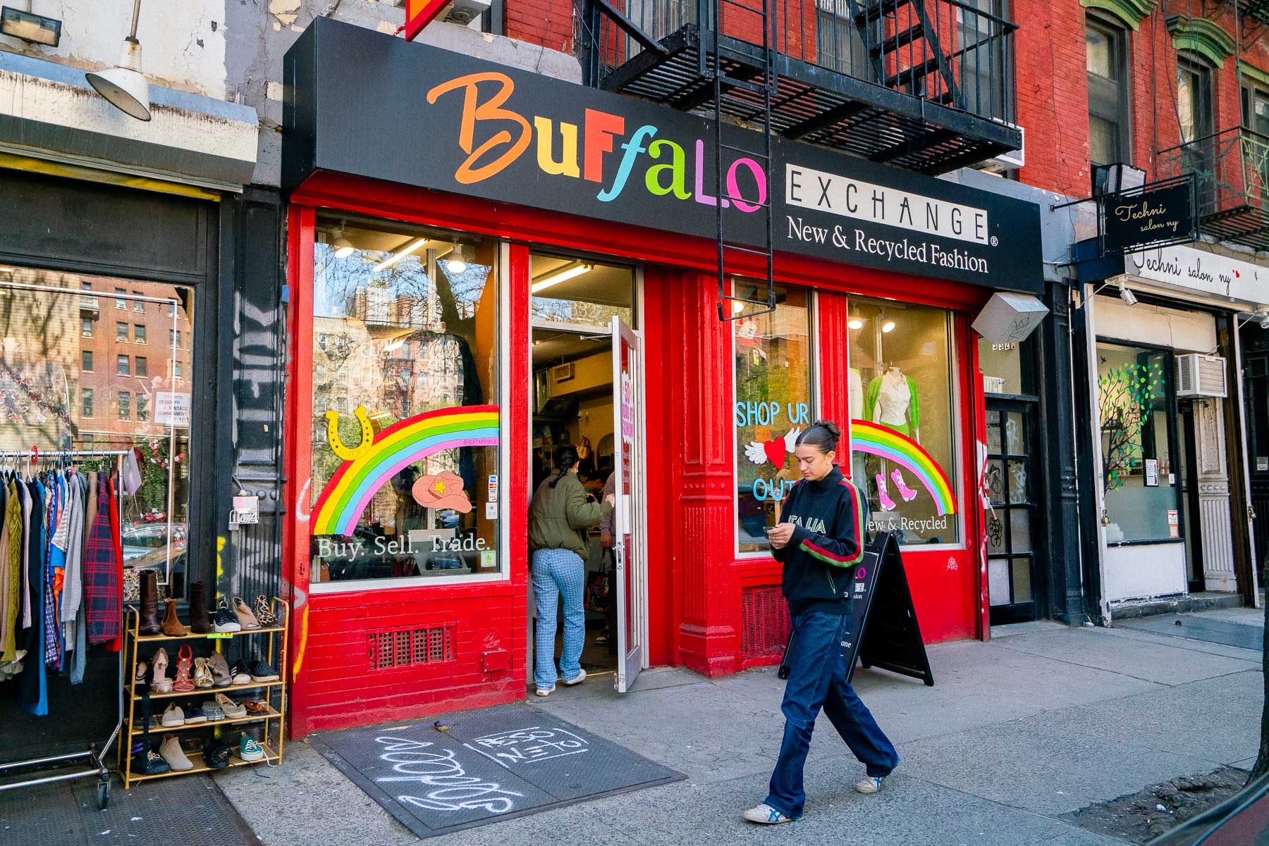 A person walks past the Buffalo Exchange storefront in the East Village.
