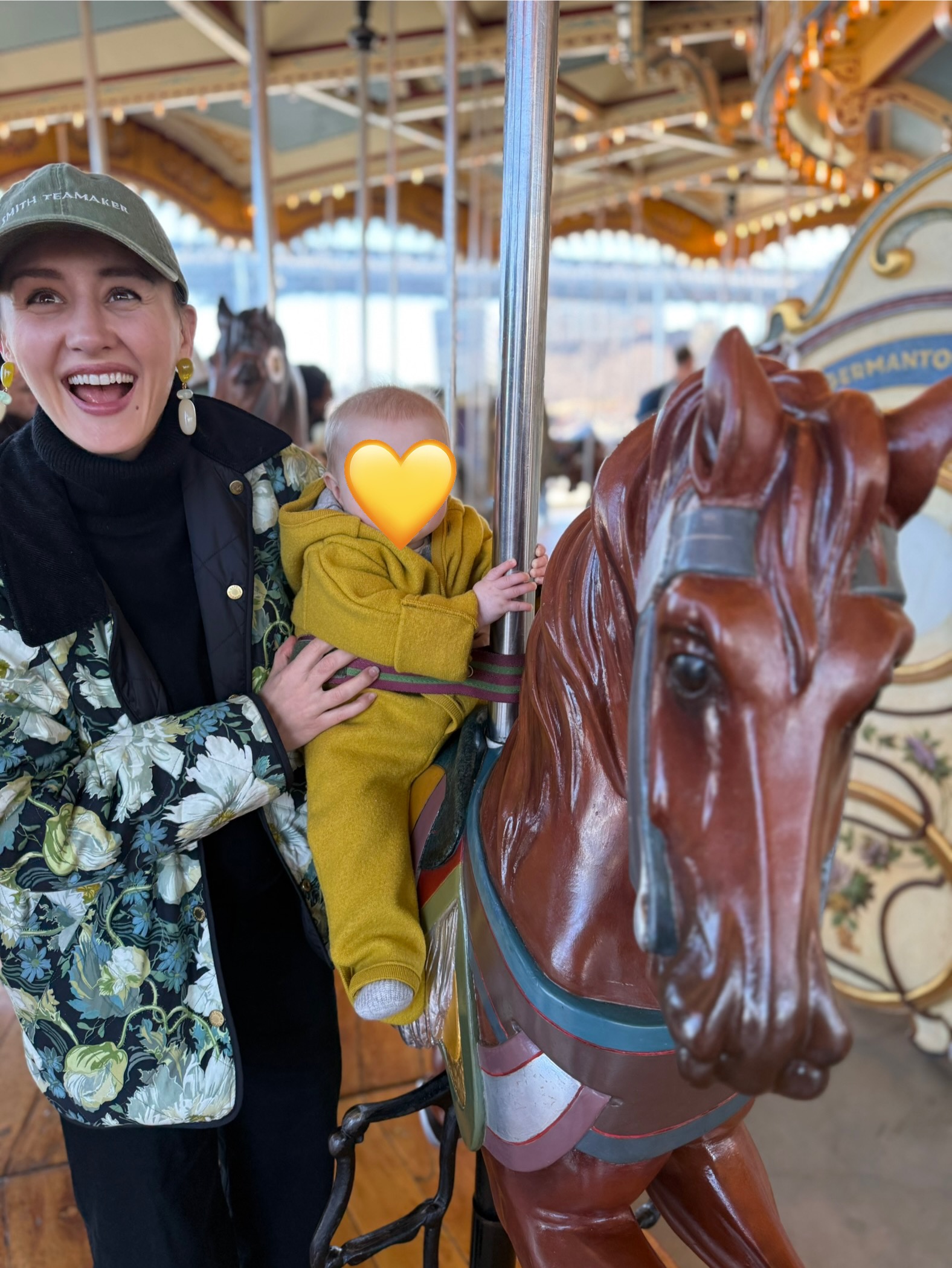 baby riding Jane's Carousel in DUMBO Brooklyn