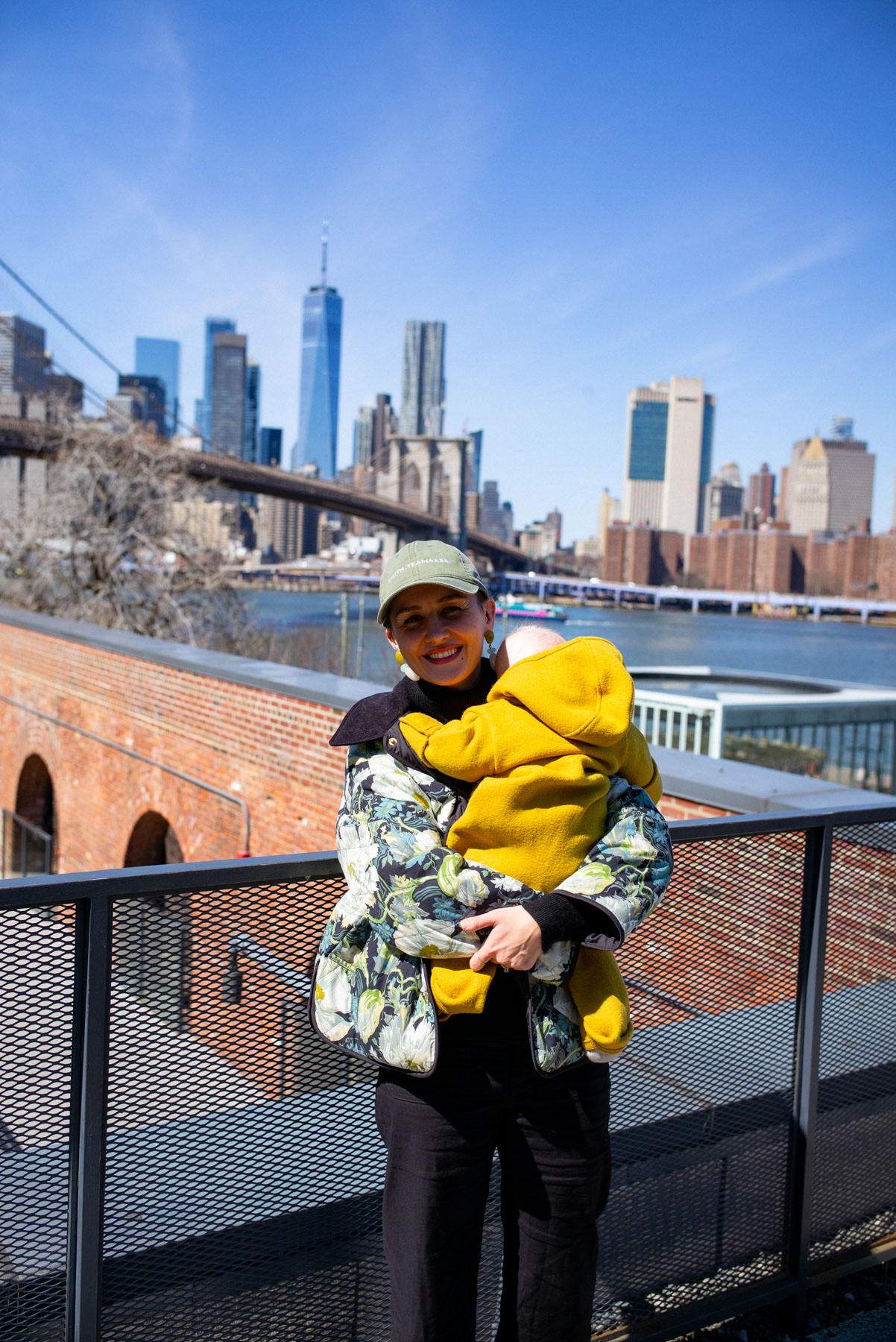 woman holding baby in DUMBO