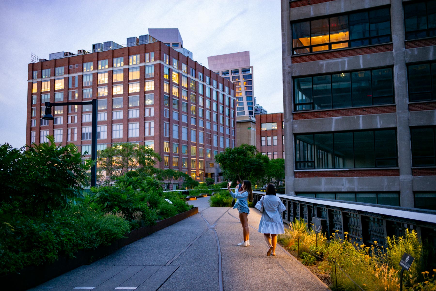 Two people walking on the High Line in NYC