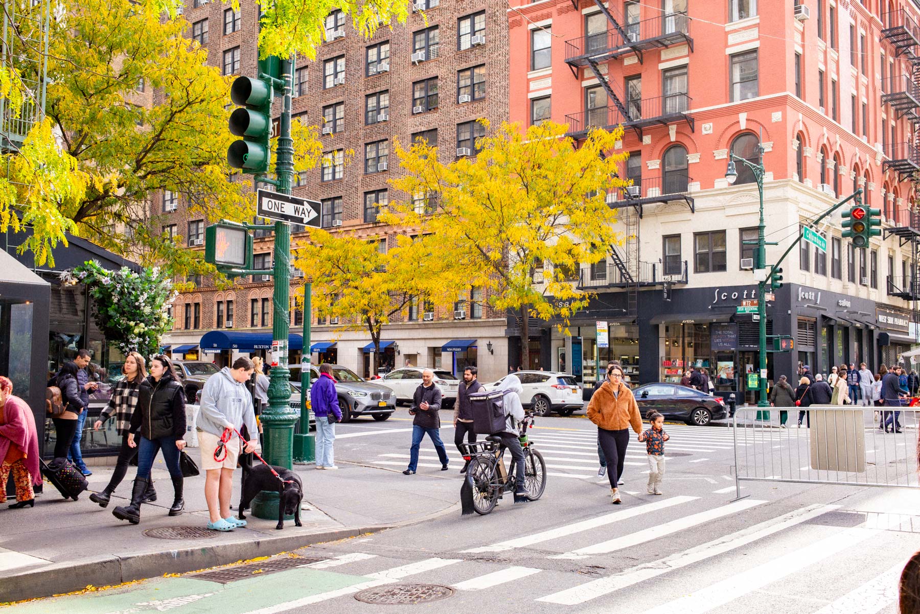 Families walking outside in a charming neighborhood in New York City