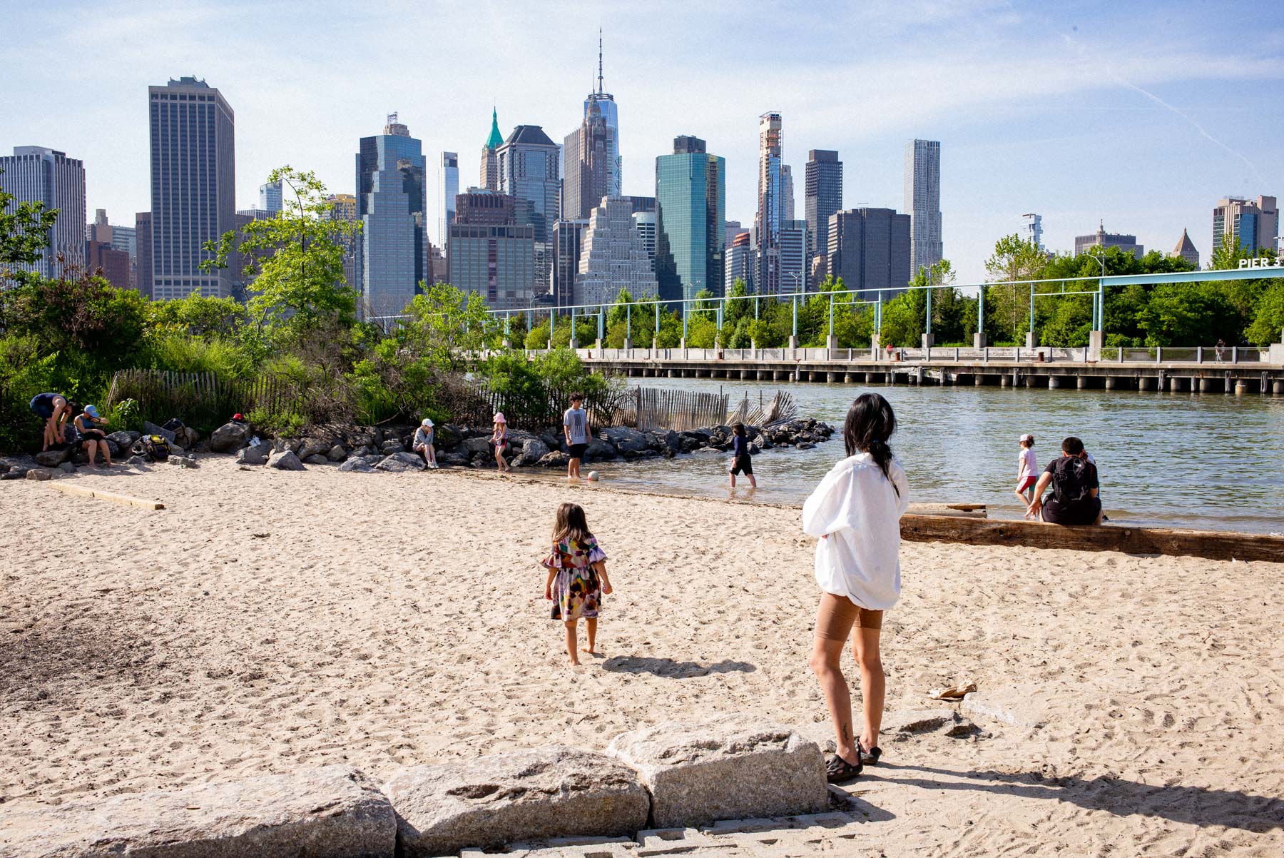 mom with kids enjoying the views at Brooklyn Bridge Park