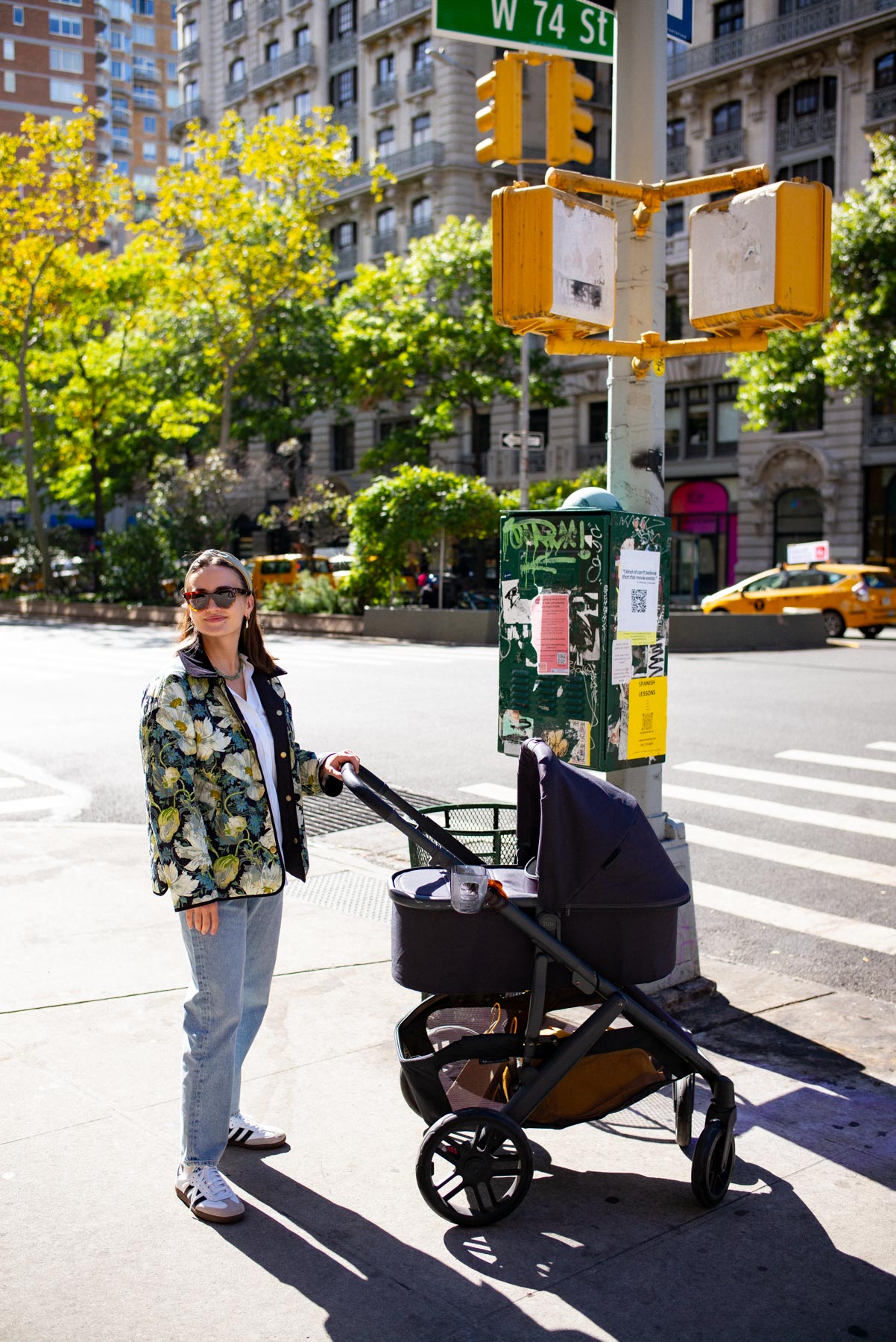 woman pushing a stroller in NYC