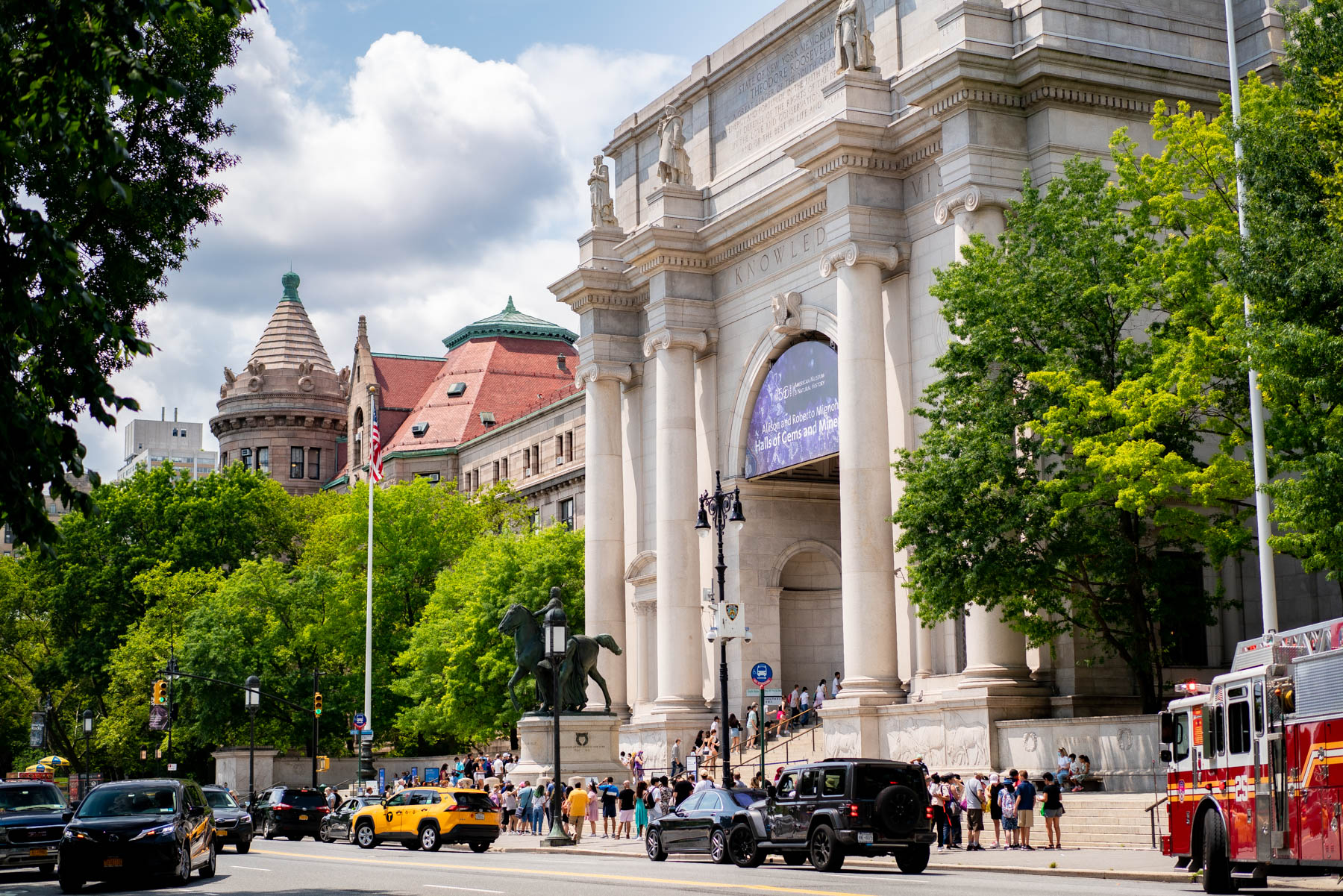 The American Museum of Natural History facade is viewed from Central Park West on a sunny day.