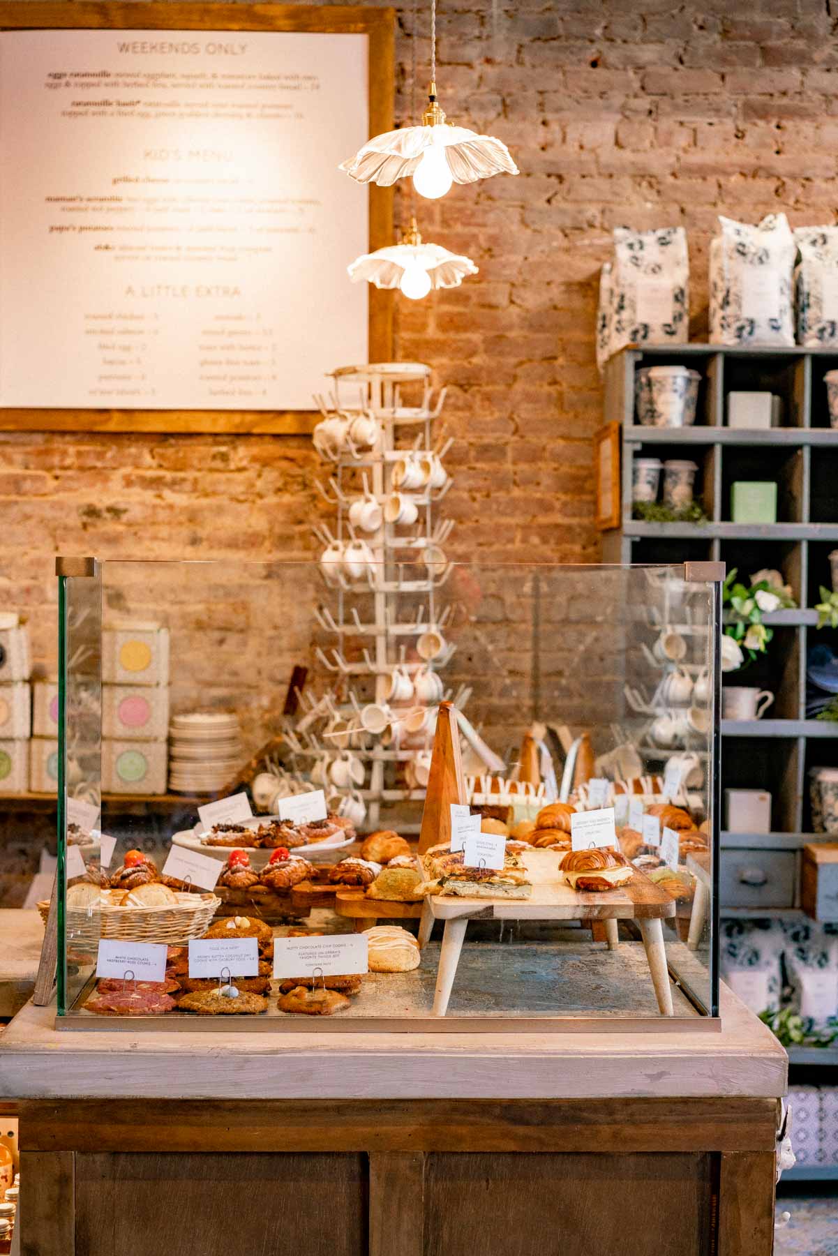 Cozy New York City cafe on a bright morning with a latte on a small table by the window